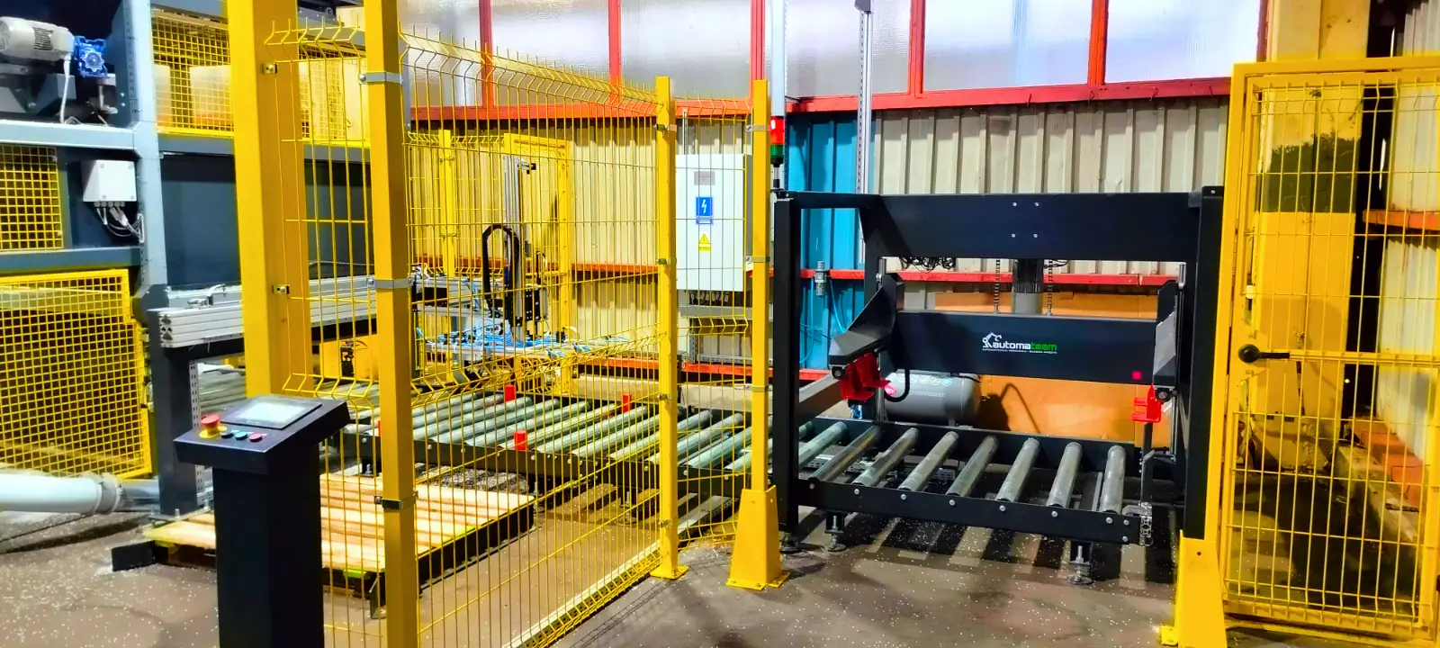 Automated granulate bag depalletizing line integrated with an empty-pallet storage system-Automateam