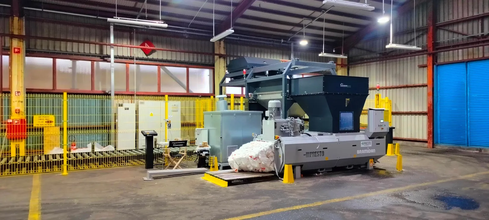 Fully automated depalletizing system for granulate bags with direct tanker loading-Automateam